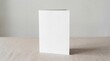 © Marina - Vertical greeting card mockup displayed on a textured table surface