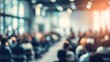 © artbot - Blurred view of people at a conference