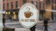 © Tatang - Artisanal coffee shop window sticker featuring steaming heart cup on a rainy urban street