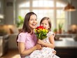 © BillionPhotos.com - Little child presenting flowers to mother, Mother's Day