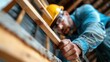 © Larisa AI - A determined construction worker, clad in work attire and a helmet, focuses intently on his task, showcasing dedication and the intricacies of manual labor.