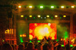 © svetlanais - Crowd with hands enjoying live music concert with vibrant stage lights and colorful LED screen in background, music festival. Concept of concert, music, entertainment, nightlife celebration