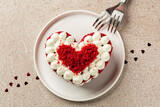 Top view of Heart Shaped Red Velvet Cake. Saint Valentines day dessert for two. Food background.