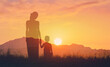© kieferpix - Parent and Child Silhouette at Sunset in Nature