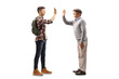 © Ljupco Smokovski - Young man with backpack giving high five to senior man