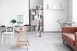 © Pixel-Shot - Interior of light hospital with human skeleton model and projector screen