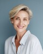 © Chandlerlikes - Middle aged woman smiling confidently, age positive beauty portrait