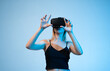 © Volodymyr_sh - Virtual reality experience with woman using VR headset, interactive technology and metaverse concept