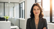 © Almubita - Confident Businesswoman Standing with Arms Crossed in Modern Office via RJ Whisk Auto