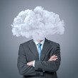 © tiero - Businessman having head in clouds concept brainstorming