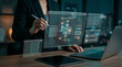 © merabbi - Businesswoman reviewing an AI agent workflow on a futuristic interface, showing data ingestion, action execution, and settings, representing advanced system management.