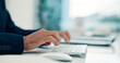 © SparkPix/peopleimages.com - Hands, man and typing computer in office for finance report, budget planning and investment proposal. Accountant, person and PC at accounting firm for email feedback, financial portfolio and research