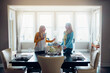 © peopleimages.com - Conversation, support and help with friends in dining room in home for connection, social reunion and lunch visit. Communication, bonding and happy with women in apartment for chat and speaking