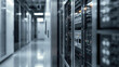 © siraphol - Server rack and data center corridor with cool lighting and reflective floor
