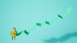 © Westend61 - Robot with upward arrow symbolizing finance growth and stability