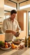 © 현욱 김 - A smiling man in a linen shirt tosses a fresh green salad with his hands in a sunlit, modern kitchen.