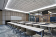 © Namsun - Professional conference room with long tables and chairs