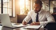 © mashimara - Focused Executive at Desk: A focused individual in a modern office, engrossed in their work, poised with a pen and laptop, embodying the spirit of productivity and dedication.