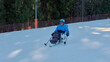 © Alex - Active skiing in the mountains for wheelchair users