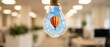 © Fernando - Light bulb with hot air balloon inside, symbolizing new ideas, innovation, and travel adventures, set against a blurred office background Concept of inspiration and creativity
