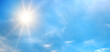 © Serghei V - Atmospheric sky view with sunlight radiating outward and white clouds drifting across open space