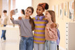 © Pixel-Shot - Teenage girls taking selfie in modern art gallery