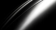 © SharpShot Studio - Close up of a sleek curved metallic surface reflecting light with a dramatic black background