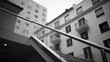 © Nattapol - Modern staircase glass railing metal handrail urban building apartment facade minimal design contemporary architecture shallow focus city
