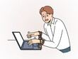 © Nadeen - Stressed Man with Hands Tied Together While Working on Laptop