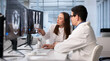 © Andrey Popov - Doctor And Technician Analyze X-ray Imaging On Computer Before Surgery