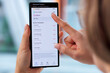 © Andrey Popov - Financial Advisor Using Online Budget App On Smartphone