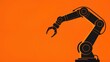 © Benjamin - Robot arm on orange background