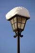 © a40757se - Vintage street light lamp with snow and blue background