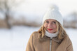 © Melinda Nagy - happy woman with white hat enjoying winter outdoors