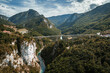 © AmazingAerialAgency - Aerial view of the Tara Bridge gracefully spans across the deep gorge, connecting the lush landscapes under a vast sky, Zabljak, Montenegro.