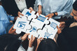 © InfiniteFlow - A diverse marketing team collaborates, holding puzzle pieces with symbols of technology, media, and advertising, representing modern digital strategies and team synergy. Amity