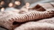 © HasyaCreative - Close Up of Beige Knitted Fabric with Soft Bokeh Lighting Background Texture Detailed Knitwear Wool Material Warmth Cosiness Simplicity