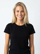© LoveDe Studio - A young, happy woman with blonde hair and a black t-shirt smiling at the camera against a white background.