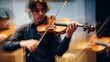 © Audax - Violin player performing with motion blur effect