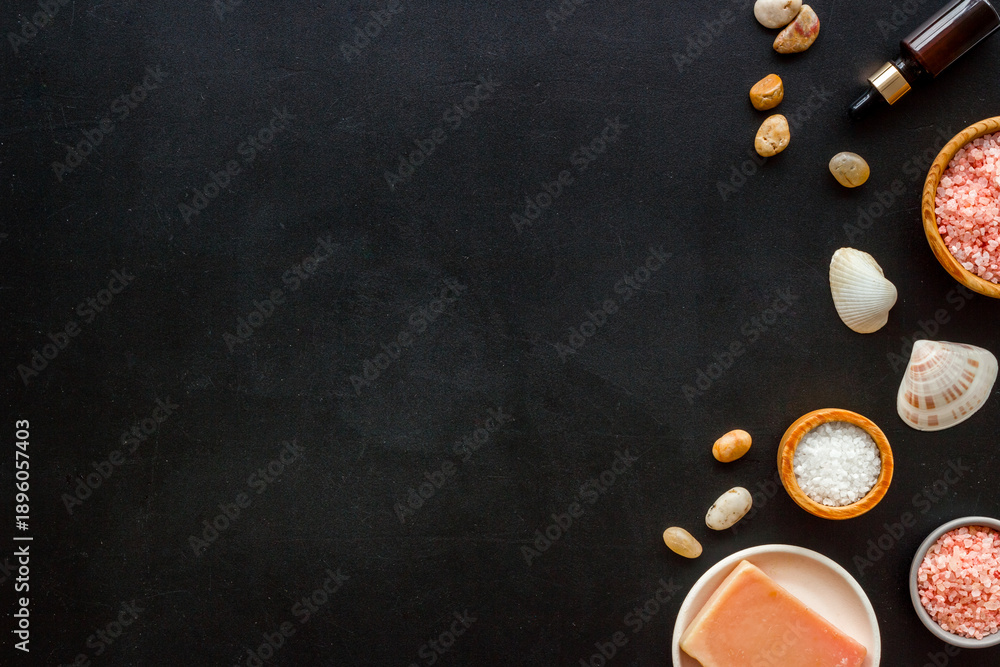 Set of body care cosmetics products with essential oil scrubs and sea salt, top view. Aromatherapy spa products