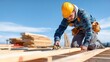 © Muhammad - A construction worker measuring lumber on a building site with a tape measure