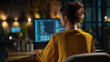© Kateryna - Back view of young woman as freelance data scientist working from home, professional coding and programming on computer remotely, big data mining with artificial intelligence engin