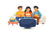 © Alan - Friends enjoy snacks while watching a movie at home during the weekend