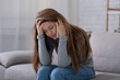 © Prostock-studio - Upset young woman talking to her psychologist on cellphone, receiving help in depression treatment at home. Millennial lady having relationship problems, consulting her therapist on phone