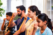 © StockImageFactory - Happy Indian parents and kids practicing pranayama yoga together indoors for healthy lifestyle