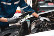 © Eakrin - Auto mechanic and checklist for fix service repairing and car care maintenance servicing change spare part engine problem or insurance support or range of car check or training workshop.