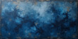 © PIXEL GLOW - An old blue grunge background texture with abstract dark smoke and stormy clouds over a bright moonlit night sky backdrop