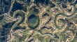 © Ascents - Aerial View of River Meanders Forming the Number 2020