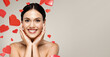 © Prostock-studio - Young european woman smiles with hands on her face, celebrating her beauty routine. She has basic makeup and is surrounded by heart shapes, set against a gray background.