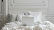 © Touch - Elegant Laptop on Bed with Pillows